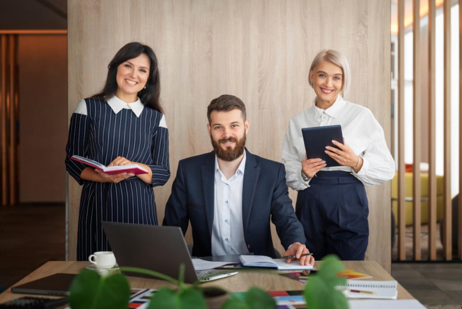 Students working together on budget planning exercises with worksheets and calculators