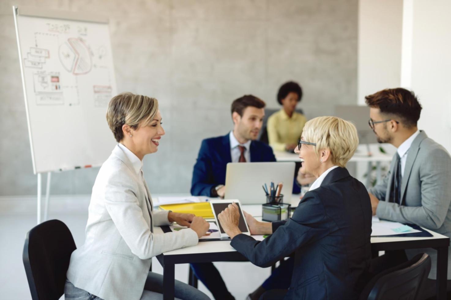 Professional workspace showing organized financial documents, calculator, and planning materials representing our systematic approach to budget education